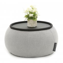 Versa table in Keystone Grey fabric with pot plant
